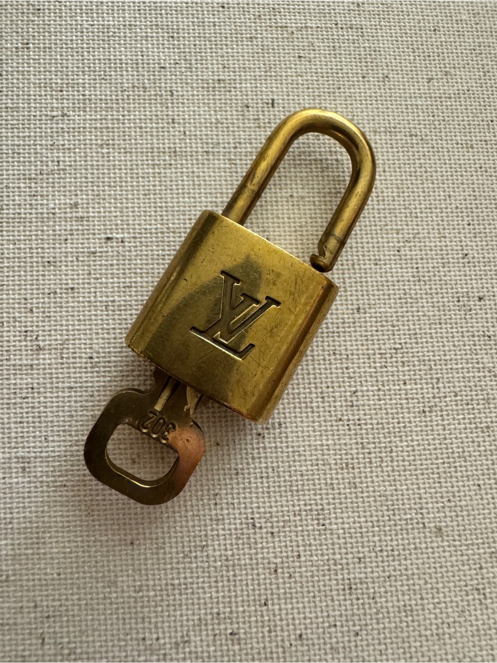 Louis Vuitton Gold Padlock with Key - AUTHENTIC